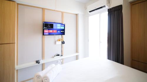 Sidoarjo Apartment | Studio Apartment at Suncity Residence Sidoarjo near Suncity Mall By Travelio
