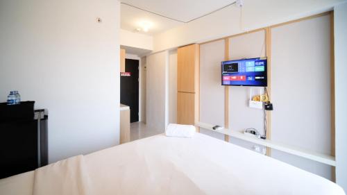 Sidoarjo Apartment | Studio Apartment at Suncity Residence Sidoarjo near Suncity Mall By Travelio
