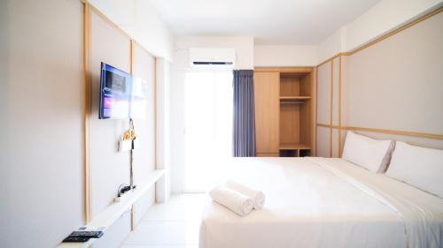 Sidoarjo Apartment | Studio Apartment at Suncity Residence Sidoarjo near Suncity Mall By Travelio