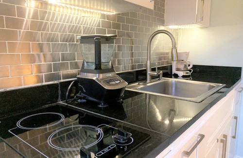 Middle River Terrace Apartment | Studio apt near Wilton Manors, fenced yard with pool, puppy friendly.