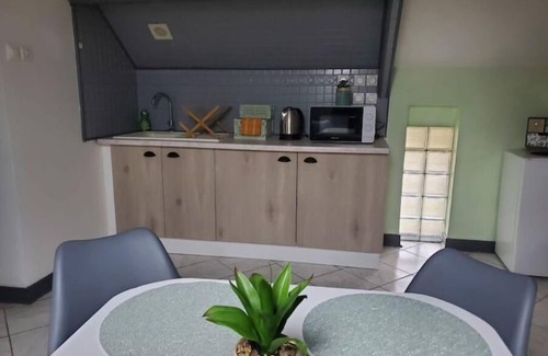 Essigny-le-Grand Apartment | Studio Ferme de la Manufacture