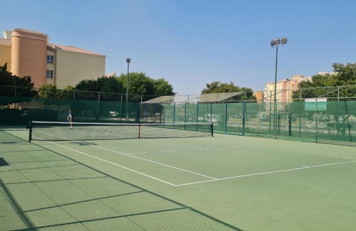 Discovery Gardens Apartment | Studio with free Tennis court at the yard