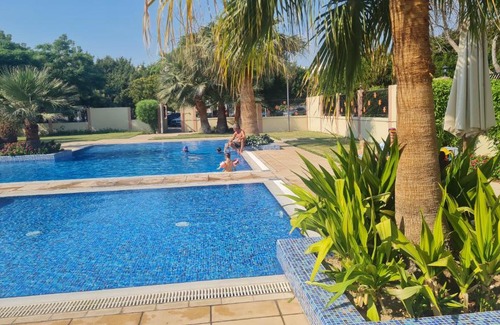 Discovery Gardens Apartment | Studio with free Tennis court at the yard