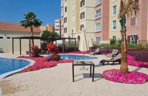Discovery Gardens Apartment | Studio with free Tennis court at the yard