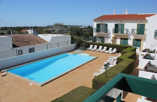 Vila Real Santo Antonio House | Stylish 2 bed house with private patio and shared swimming pool