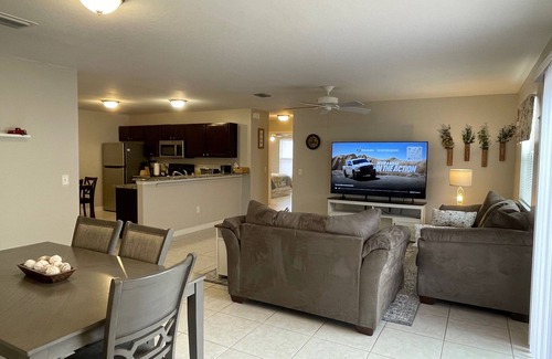 Duval House | Stylish Home in Duval w/Granite, Tile Floors, Glass Lanai & Gas Golf Cart!