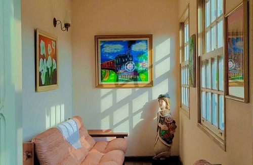 Ouro Preto Apartment | Suíte com Vista Para a Montanha