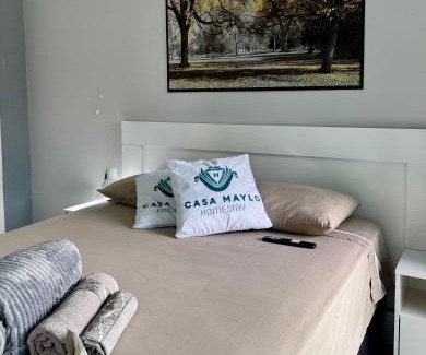 Capoeiras House | Suíte Conforto com AR, TV e sacada em Florianópolis
