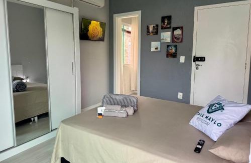 Capoeiras House | Suíte Conforto com AR, TV e sacada em Florianópolis