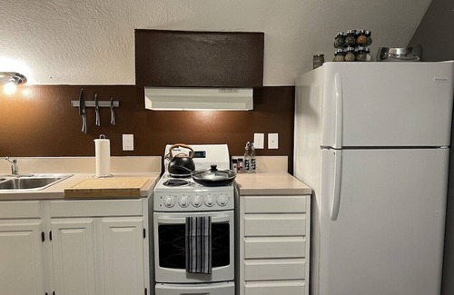 Northeast Neighbors Apartment | Suede- A stylish studio: extended stays, garden