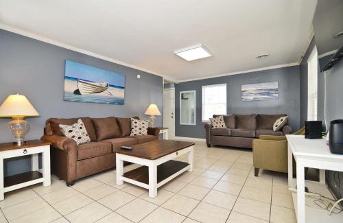 Cherry Grove Beach House | Suns Out Steps to Beach w Private Pool in Cherry Grove