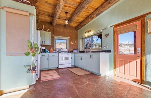 San Cristobal House | Sweet & Sunny Adobe Home