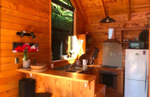 Tairua House | Tairua Treetops - cosy home with stunning views and hot tub