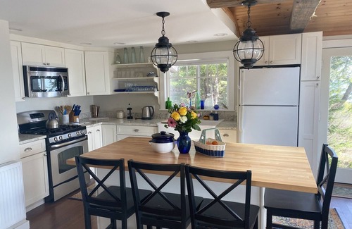 Prospect Harbor House | Take in the breathtaking views at our popular oceanside cottage with large deck.