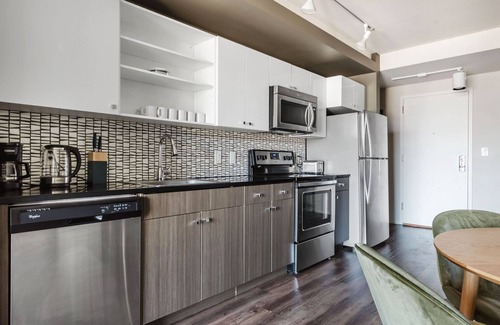 Theatre District Apartment | Tasteful Chinatown/Theater Dist 2BR w/Gym, nr Dining, by Blueground