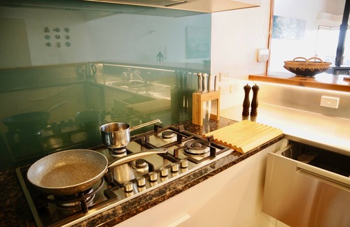Te Ngaire House | Te Koha: Luxury hillside beach residence @ Te Ngaere Bay