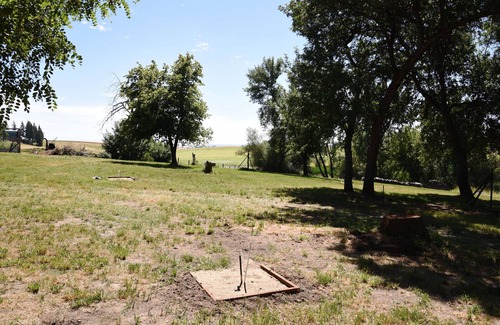Harvard RV Rental | Tent Platform 3 | Pond View Glamping Tent