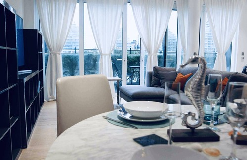 Sands End Apartment | Thames riverside apartment in London
