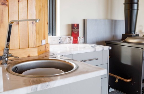 Tomich Cabin | The Boathouse - an off grid bothy that sleeps 2 guests in 1 bedroom