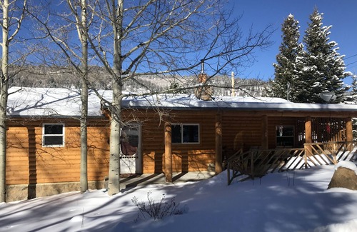 Holman Cabin | The Cabin back deck offers stunning views and only 15 minutes from Sipapu Skiing