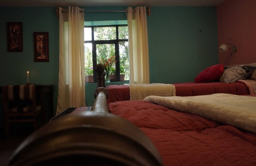 Huayllabamba House | The Corner with a Flower Balcony and Panoramic View.