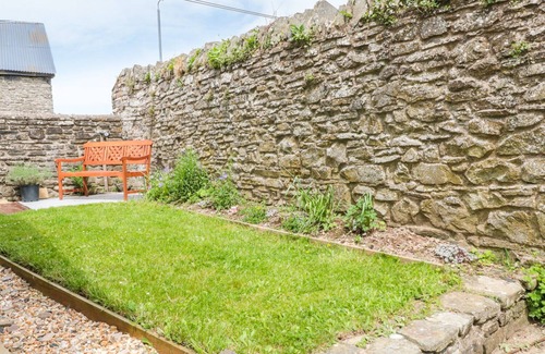 Kington House | THE COURTYARD, with a garden in Gladestry
