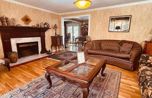 North End House | The Doll House an eclectic style of art and old fashioned doll and antique collections in a doll house designed home in Boise's desirable North End across from a nice park with tennis and basement and walking trails near shopping, hiking, biking, skiing