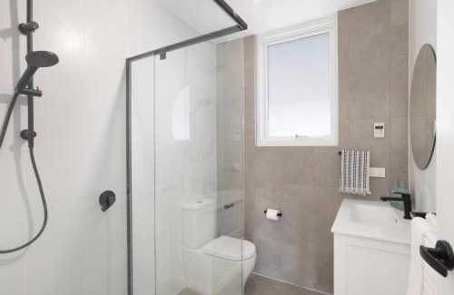 Christies Beach Apartment | The Elements l Earth l 4 Stunning Apartments each with Private Outdoor Dining l Walk to the Beach l Pet Family and Event Friendly l Wifi l Netflix l Outdoor Shower l Communal BBQ Pavilion and Lawn Area l