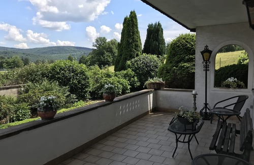 Hirschhorn House | "The Enchanted Cottage" is a chic private garden apartment with gorgeous views.