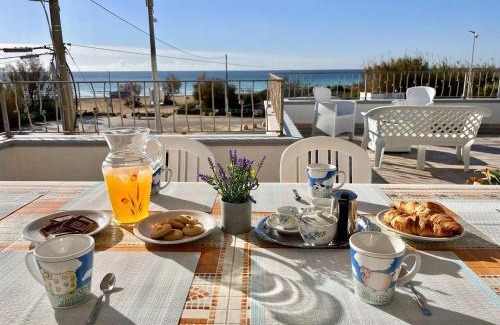 Posto Vecchio Apartment | The Front Beach Penthouse 20 m by Salento Prime