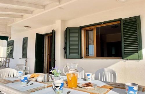 Posto Vecchio Apartment | The Front Beach Penthouse 20 m by Salento Prime