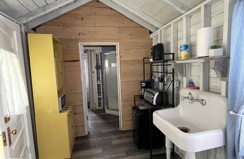 Canadohta Lake Cottage | The Goldfinch rustic lakefront cottage at The Pier at Canadohta Lake sleeps 2!