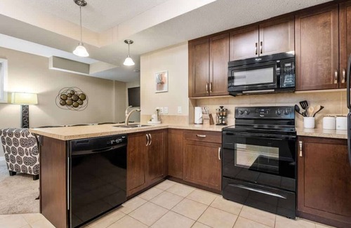 Southeast Calgary House | The Grande 1BD 1BA - Full Kitchen Guest Suite