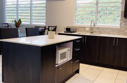 Bairoa Villa | The Guest House at Caguas Villa - Private Trails & River