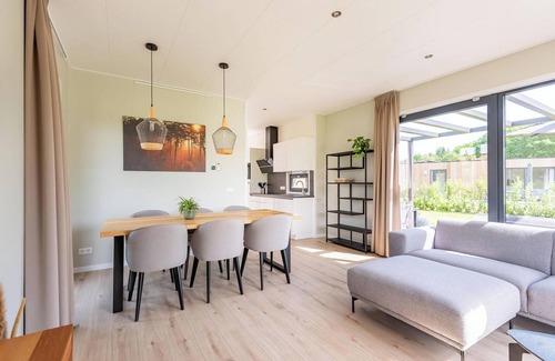 Kotten House | The six-person Parklodge 6 with Dog Fence, Sauna and Hot Tub has a spacious living room, open kitchen, three bedrooms and a spacious patio.