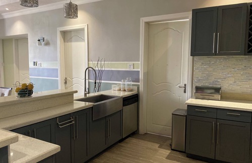 Constant Spring Apartment | The Sky Lounge - 2BD APT w/Amazing Roof Deck Views