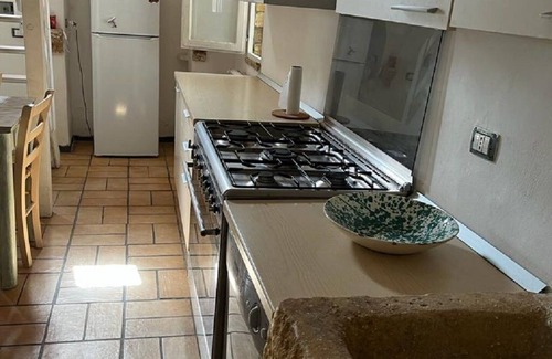 Pisticci House | The Three Arches: house nestled among olive trees in the Lucanian countryside.
