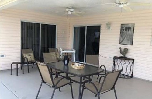Sanibel House | The Villages FL Community w/Elec. Golf Cart. Restaurants, Shopping & Hospitals.