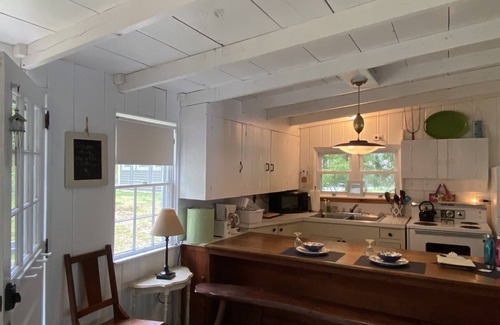 West Poland Cottage | The Wee White Cottage on Tripp Lake in Poland, Maine.
