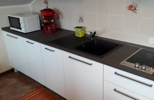 Madonna dell'Olmo Apartment | The world in a room