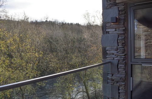 Backbarrow Cottage | This charming second floor apartment has unrivalled views of the River Leven.