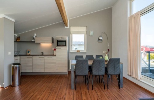 Oude-Tonge House | This detached island house has the living room on the first floor with spacious roof terrace and sta