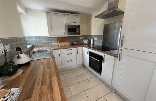 Pendine House | This immaculately presented bungalow makes the perfect holiday home couples or small families