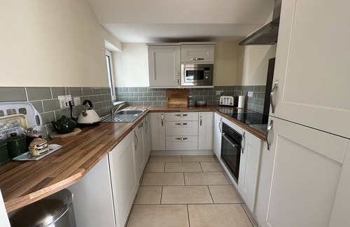 Pendine House | This immaculately presented bungalow makes the perfect holiday home couples or small families