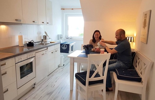 Ellenberg Apartment | This large vacation apartment "Fischreiher 1" with waterfront property, rowing boat and in-house bicycles is one of the most beautiful vacation residences on the Baltic Sea fjord Schlei