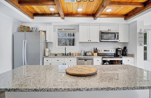 Townsend House | This newly built home has much to offer! hot-tub , fenced in back yard .