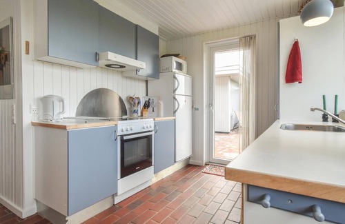 Næs House | This two-story stone and wooden house has been recently renovated.