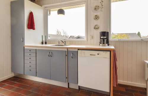 Næs House | This two-story stone and wooden house has been recently renovated.