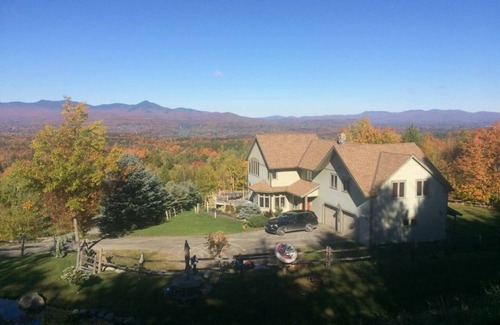 Morrisville House | TOP OF THE WORLD over Stowe, Hot Tub, with Tesla plug. Sleeps up to 17.