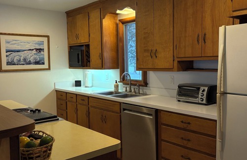 Alden Cottage | Torch lake waterfront:100 ft of sandy beach, 3-bedroom, 3-bath cottage